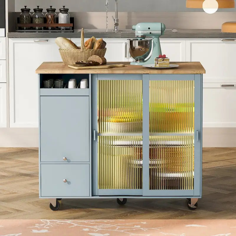 Carrello isola da cucina con piano a ribalta, illuminazione LED e ante in vetro scanalato su ruote