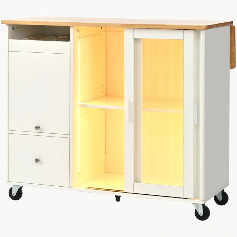 Carrello isola da cucina con piano a ribalta, illuminazione LED e ante in vetro scanalato su ruote